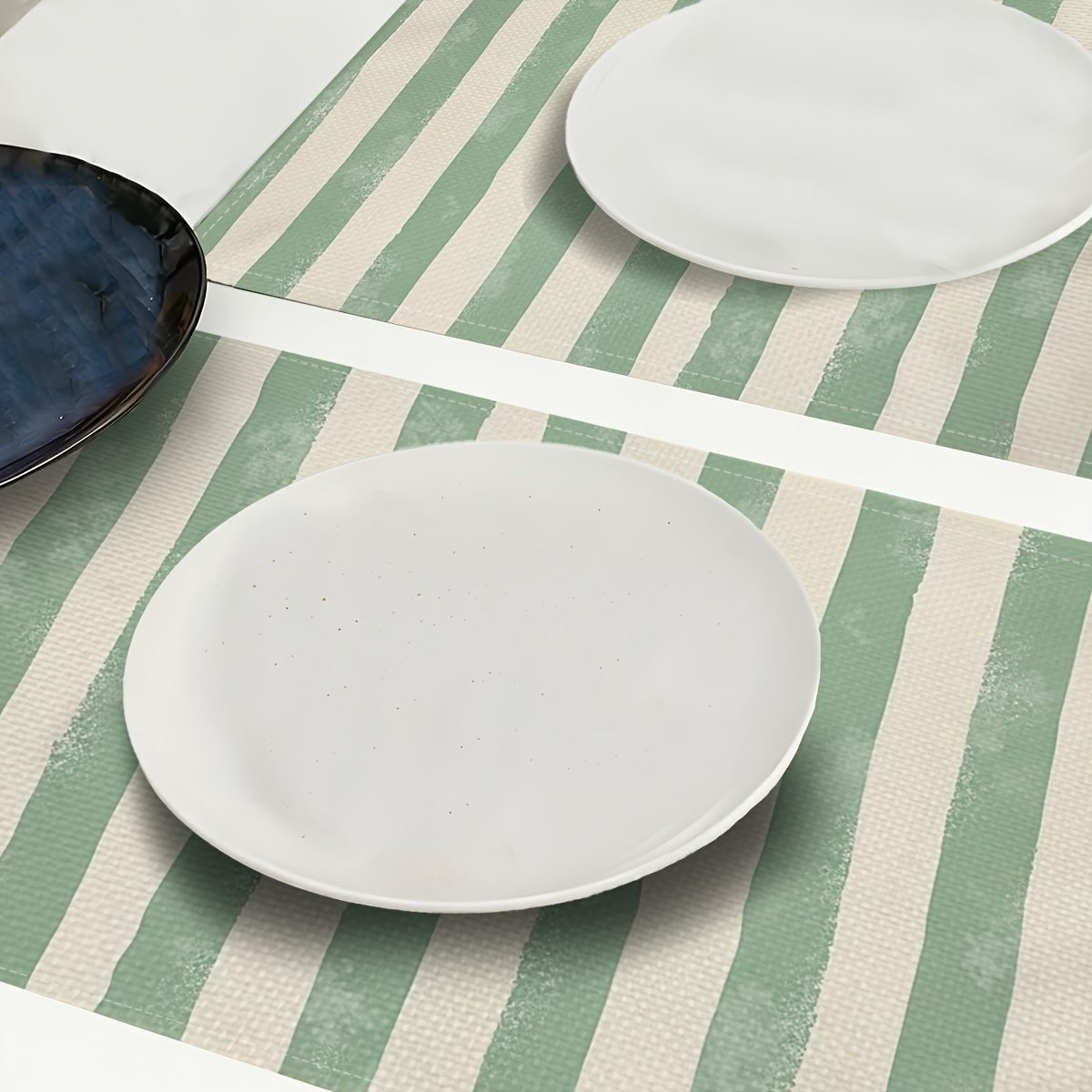 4 Tischsets mit Plattfischmotiven und Streifenmuster, ideal zur Tischdekoration. Diese dicken Sets schützen den Tisch._voghion.com
